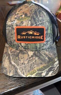 Rustic Ridge Camouflage Trucker Hat with Mountain Patch